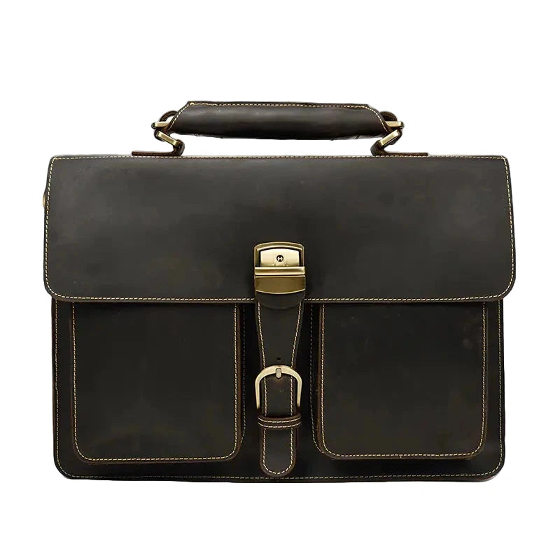 Black leather briefcase with gold hardware on a white background