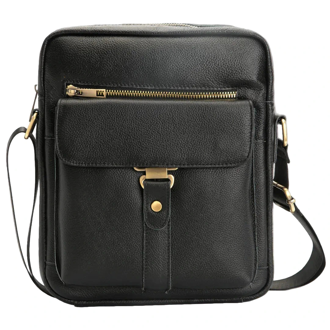 Black leather crossbody bag with gold accents on a white background