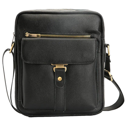Black leather crossbody bag with gold accents on a white background