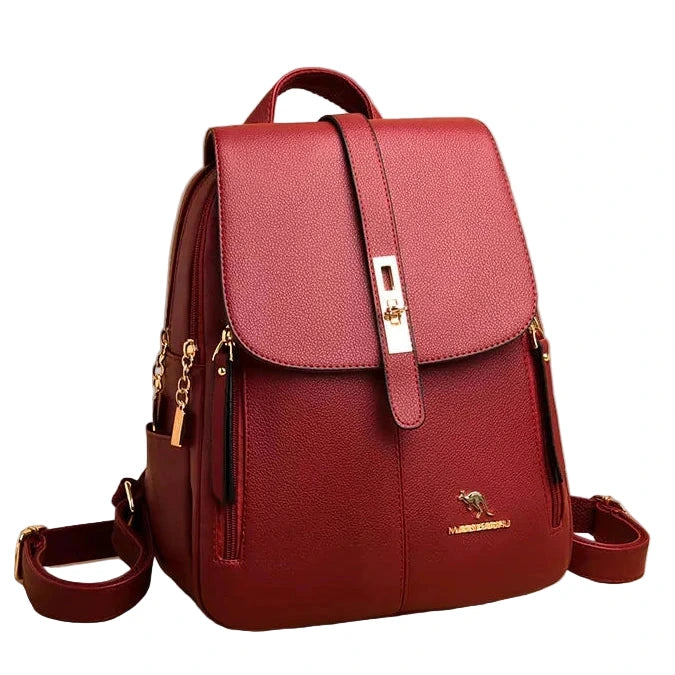 Red backpack with a brand logo on a white background