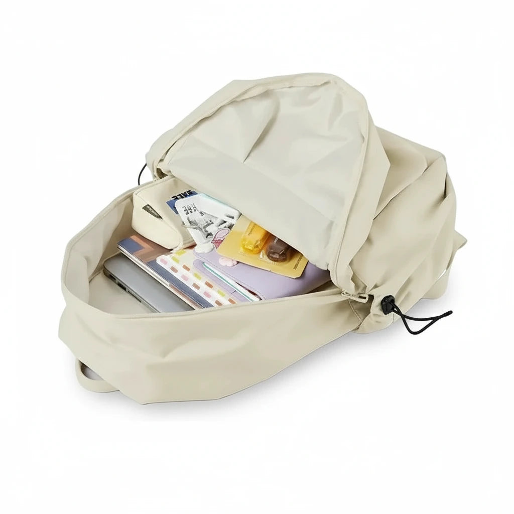 Beige backpack with labeled features on a white background