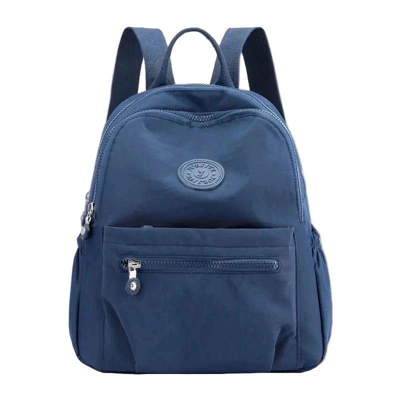 Blue backpack with a visible brand logo on a white background