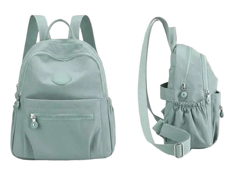 Light blue backpack with dimensions on a white background