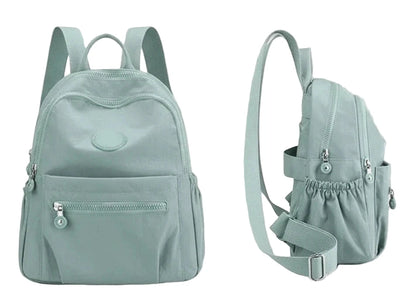 Light blue backpack with dimensions on a white background