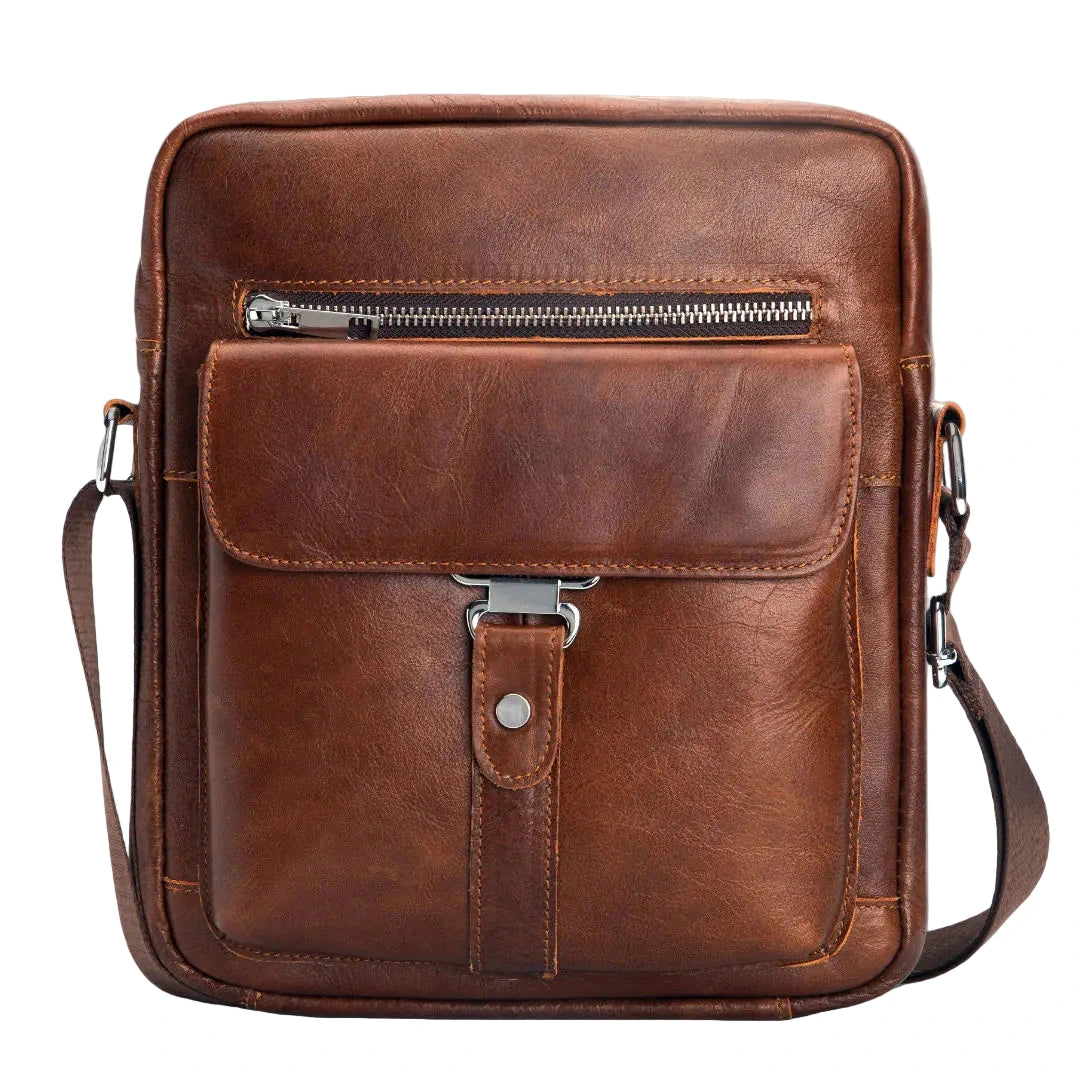 Brown leather crossbody bag with a zipper pocket on a white background