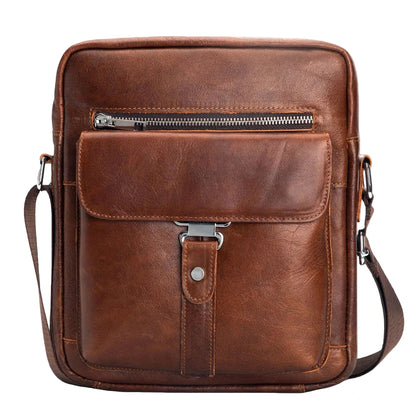Brown leather crossbody bag with a zipper pocket on a white background
