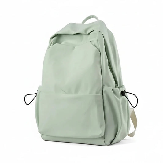 Light green backpack with features listed on a white background