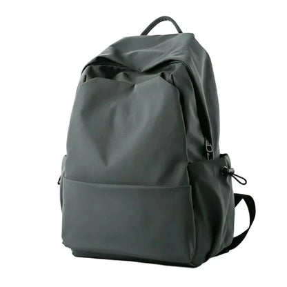 Dark gray backpack with features listed on a white background