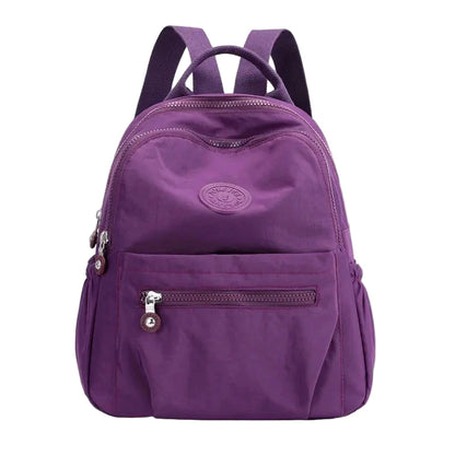 Purple backpack on a white background