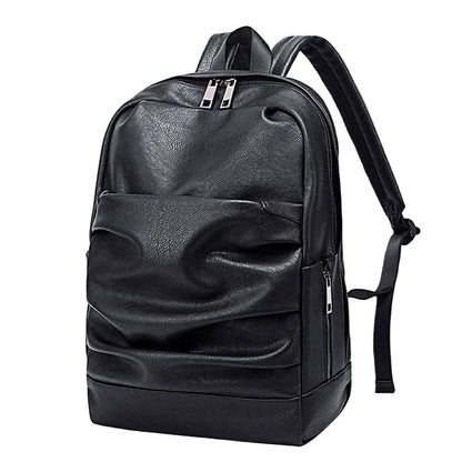 Black leather backpack on a white background