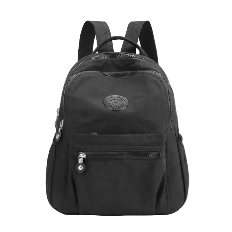 Black backpack with a visible brand logo on a white background