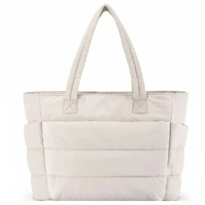Beige tote bag with dimensions displayed on a white background