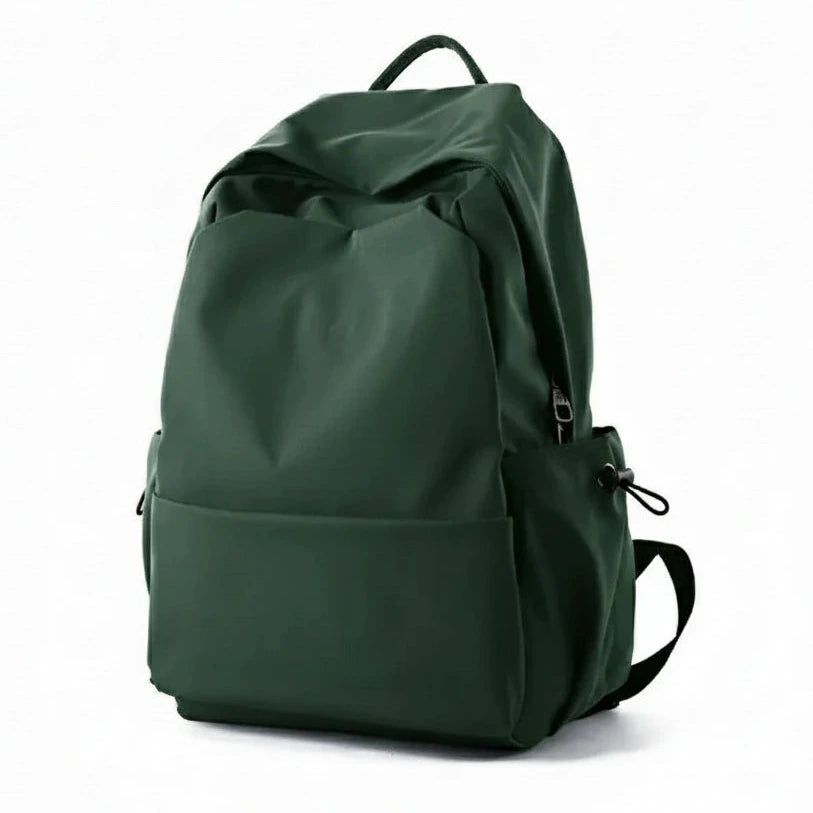 Green backpack with features listed on a white background